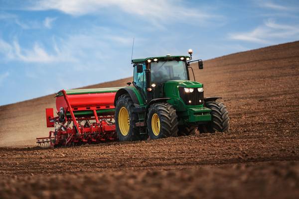 john deere tractor working land