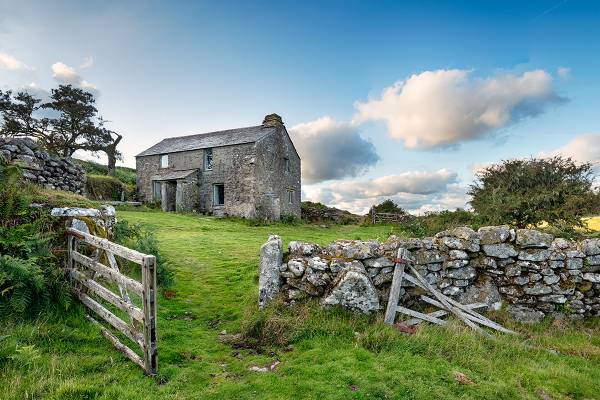 old stone cottage in need of restoration ie it needs doors, windows and a roof!